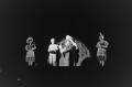 Photograph: [Photograph of individuals performing on stage]