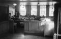Photograph: [Photograph of individuals seated in a restaurant]