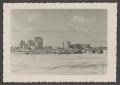 Photograph: [Automobiles parked at the beach]