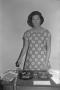Photograph: [Professor Dorothy Virginia Botkin standing at a desk]