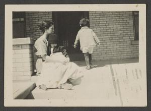 Primary view of object titled '[Irene with Byrd III and John on a porch]'.