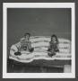Photograph: [Byrd IV and Pam on a couch]