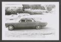 Photograph: [Photograph of three parked automobiles]