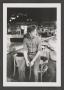 Photograph: [Photograph of Byrd Williams IV sitting in a bar]