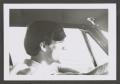 Photograph: [Photograph of a young man driving, 2]