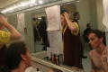 Primary view of [Actors in front of dressing room mirrors]