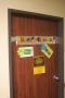 Photograph: [Missy and Cassie's dorm room door]
