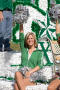 Photograph: [NT Dancers waving on float in UNT Homecoming Parade, 2007]