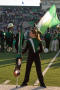 Photograph: [Color Guard member on field at Homecoming game, 2007]