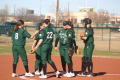 Photograph: [UNT players gathered at pitcher's circle]