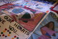Photograph: [AIDS quilt laid out]
