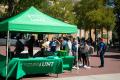 Photograph: [Multicultural Center booth in Library Mall courtyard]