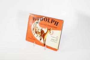 Primary view of object titled '[Rudolph the Red-Nosed Reindeer: The Complete Story with Pop-Up Action Pictures]'.