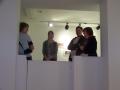 Photograph: [Artists interacting at gallery]