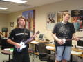 Photograph: [Students playing Guitar Hero]