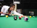 Primary view of [Young man playing pool at 3rd Annual APAEC]
