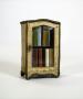 Photograph: [Miniature cabinet filled with La Gracieuse books]