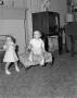 Photograph: [Photograph of Pam and Byrd Williams IV as toddlers in a living room]