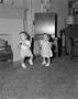 Photograph: [Photograph of Pam and Byrd IV in a living room as toddlers]