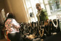 Photograph: [People at jewelry booth during 2012 TABPHE conference 1]