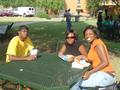 Photograph: [Students at picnic table at 2005 Koinonia 1]
