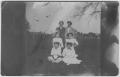 Primary view of [Four women and two men outdoors]