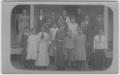 Photograph: [A group of children and adults]
