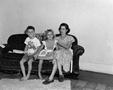 Photograph: [Tim, Carol and Doris on a couch]