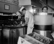 Photograph: [A cook and Susie Morgan at Ernie's Big Burger Cafe]
