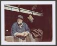 Photograph: [Older man in a jean jacket and hat]