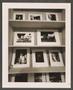 Photograph: [Shelf with photographs taken by Byrd Williams IV]