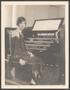 Photograph: [Photograph of Helen Hewitt at organ]