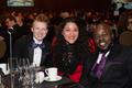 Photograph: [Three guests at Black Tie dinner event]