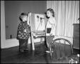 Photograph: [Children at Art Easel 1942]