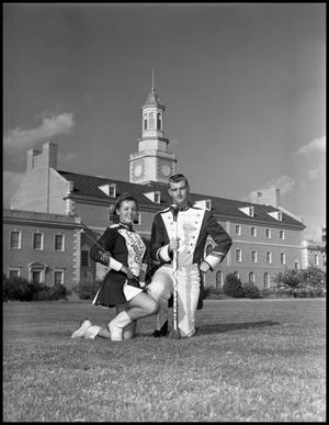 Primary view of object titled '[Marching Band Baton Twirlers in front of Administration Building]'.