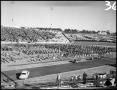 Photograph: [Band - Marching #1 - On Field - 1957]