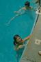 Photograph: [Pam swimming in a pool]