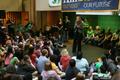 Photograph: [Chelsea Clinton speaks in front of crowd at UNT Union]