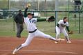 Photograph: [North Texas softball player pitches during a game, 4]