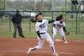 Photograph: [North Texas softball player pitches during a game, 5]