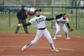 Photograph: [North Texas softball player pitches during a game, 6]