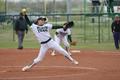 Photograph: [North Texas softball player pitches during a game, 7]
