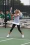 Photograph: [Olga Catalina Cruz Gomez swings racket during tennis match]