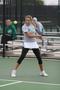 Photograph: [Olga Catalina Cruz Gomez swings racket during tennis match, 2]