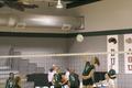 Photograph: [Women's Volleyball player spikes ball over the net, 2]