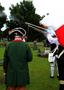 Thumbnail image of item number 1 in: '[Color Guard performs musket salute during grave marking ceremony for C. B. Dorchester, 2]'.