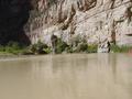Photograph: [People canoe in Big Bend canyon mouth, 2]