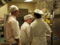Photograph: [SMHM students at in kitchen at The Club]