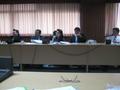Primary view of [Attendees sit around conference table, UNT delegation's trip to Thailand, 3]