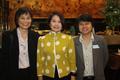 Photograph: [Patamaporn Sukplang and Acharawan Thongmee with woman at UNT alumni …